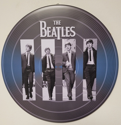 The Beatles rond relief reclamebord
