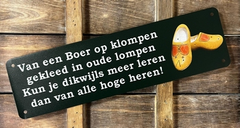 Een boer op klompen oude lompen metalen wandbord