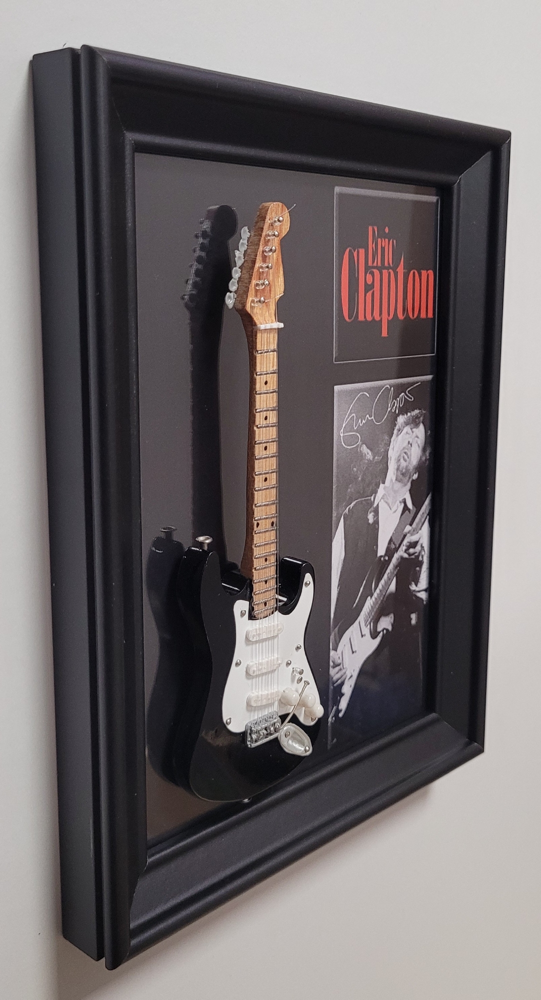 Eric Clapton lijst met zwarte gitaar