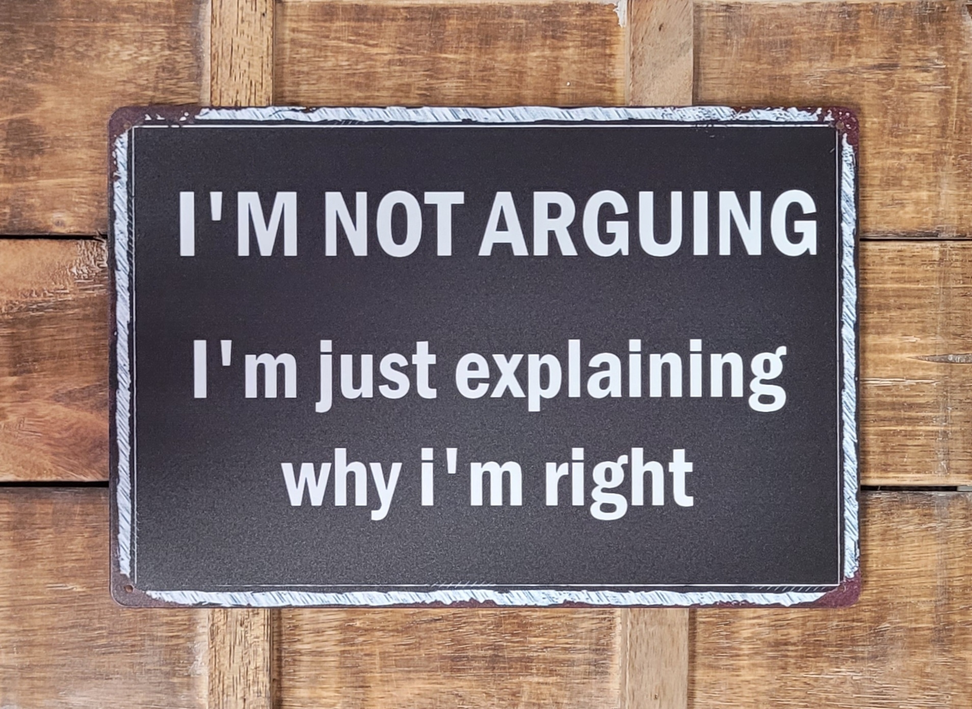 I'm not Arguing wandbord van metaal