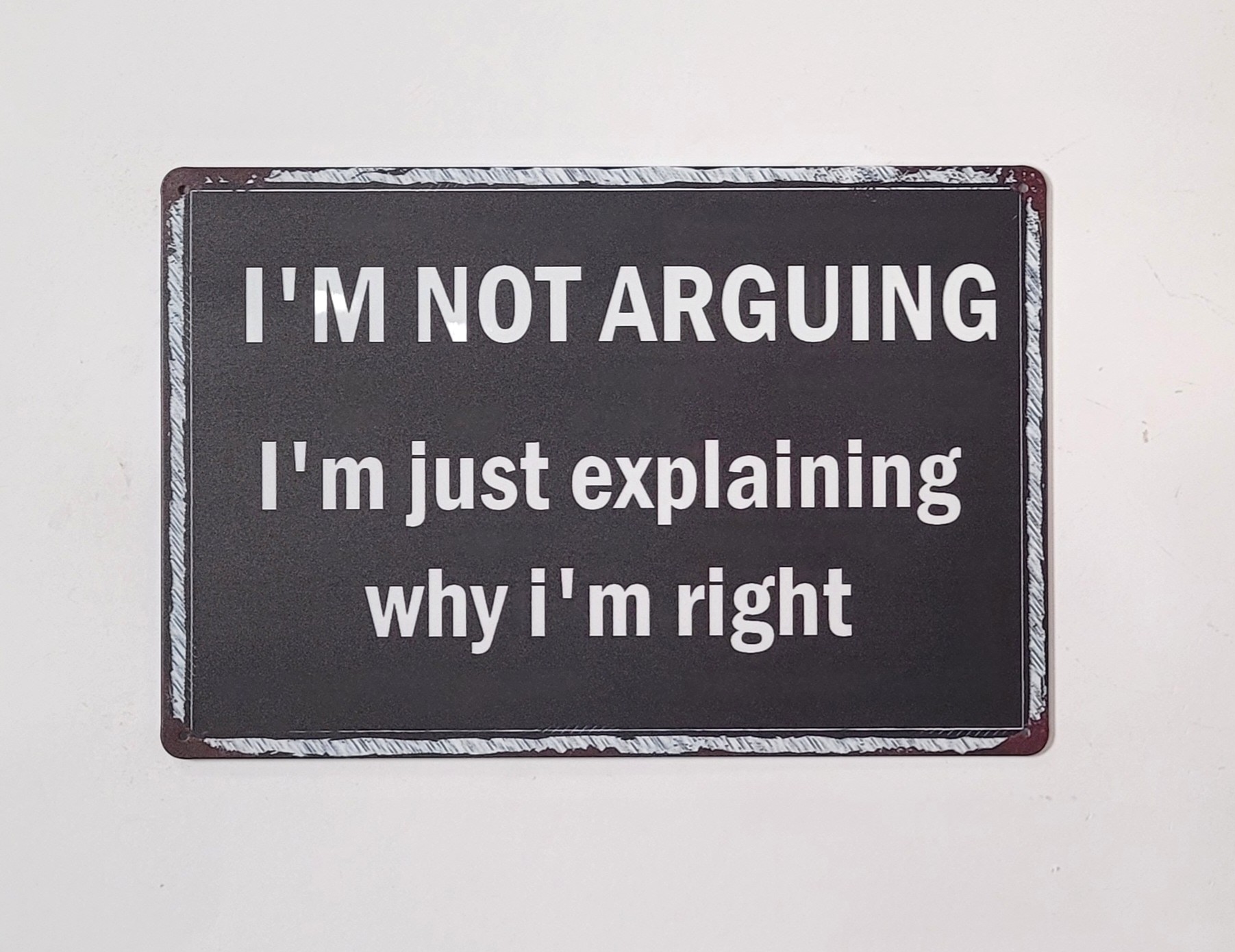 I'm not Arguing wandbord van metaal