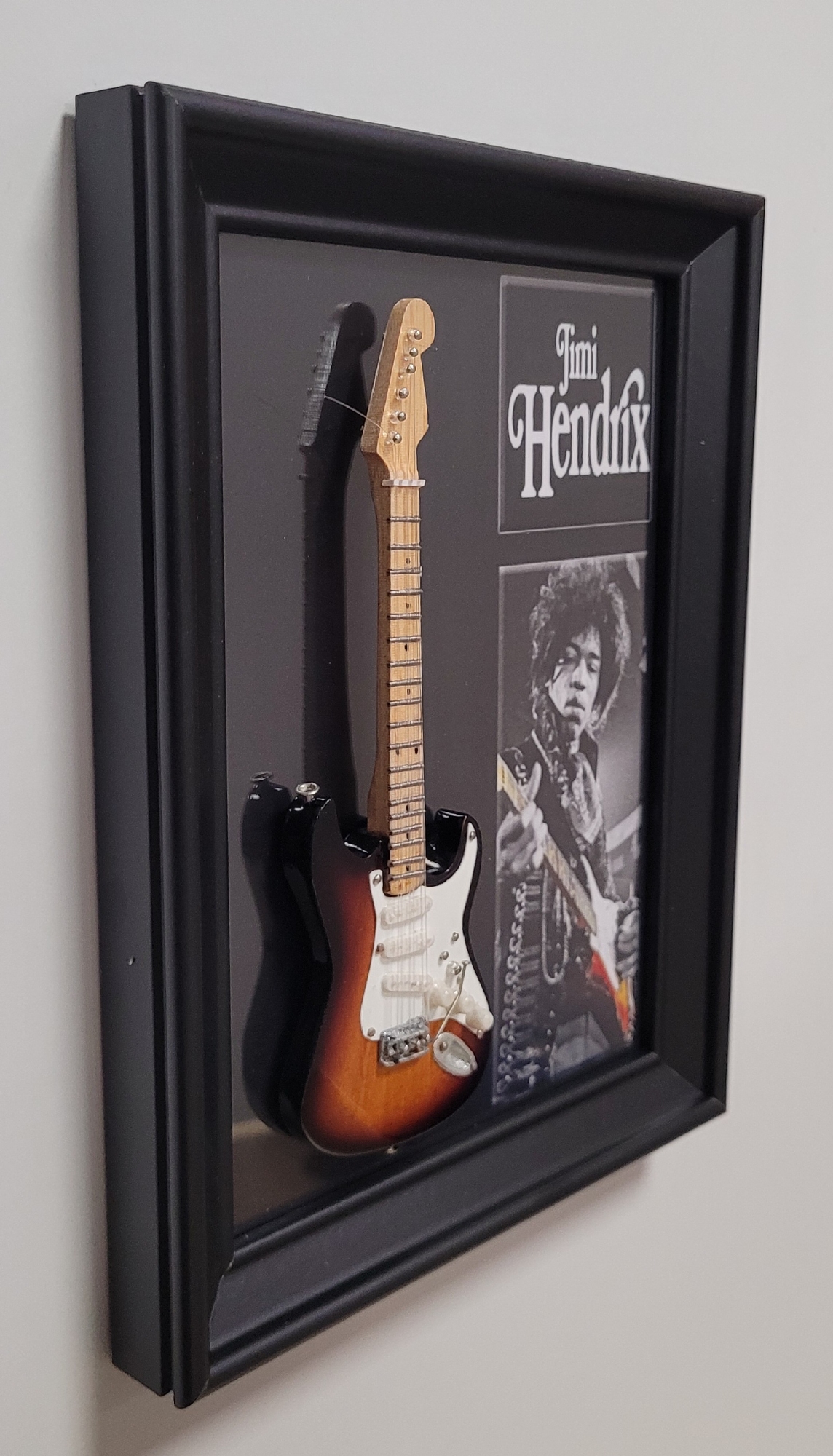 Jimi Hendrix lijst met gitaar