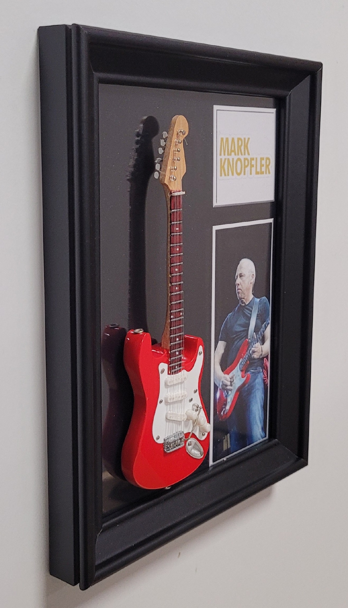 Mark Knopfler lijst met rode gitaar